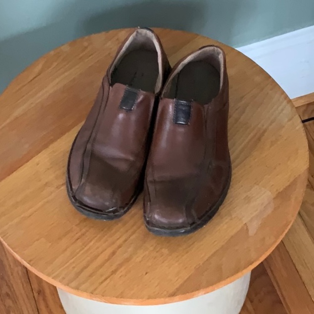 Clark’s brown slip loafers